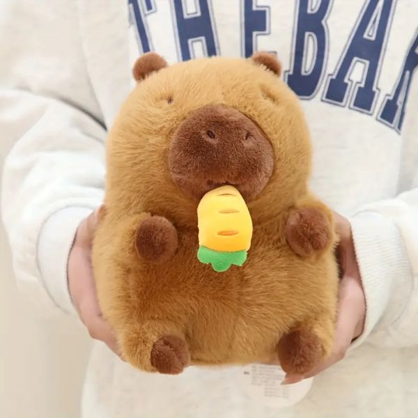 Peluche capibara con zanahoria